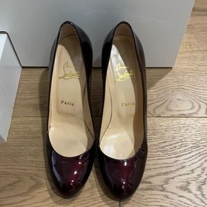 Christian louboutin wine colored glossy pumps